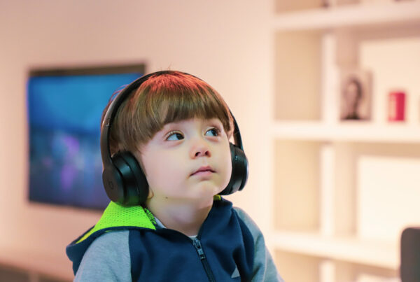 kid wearing headphones